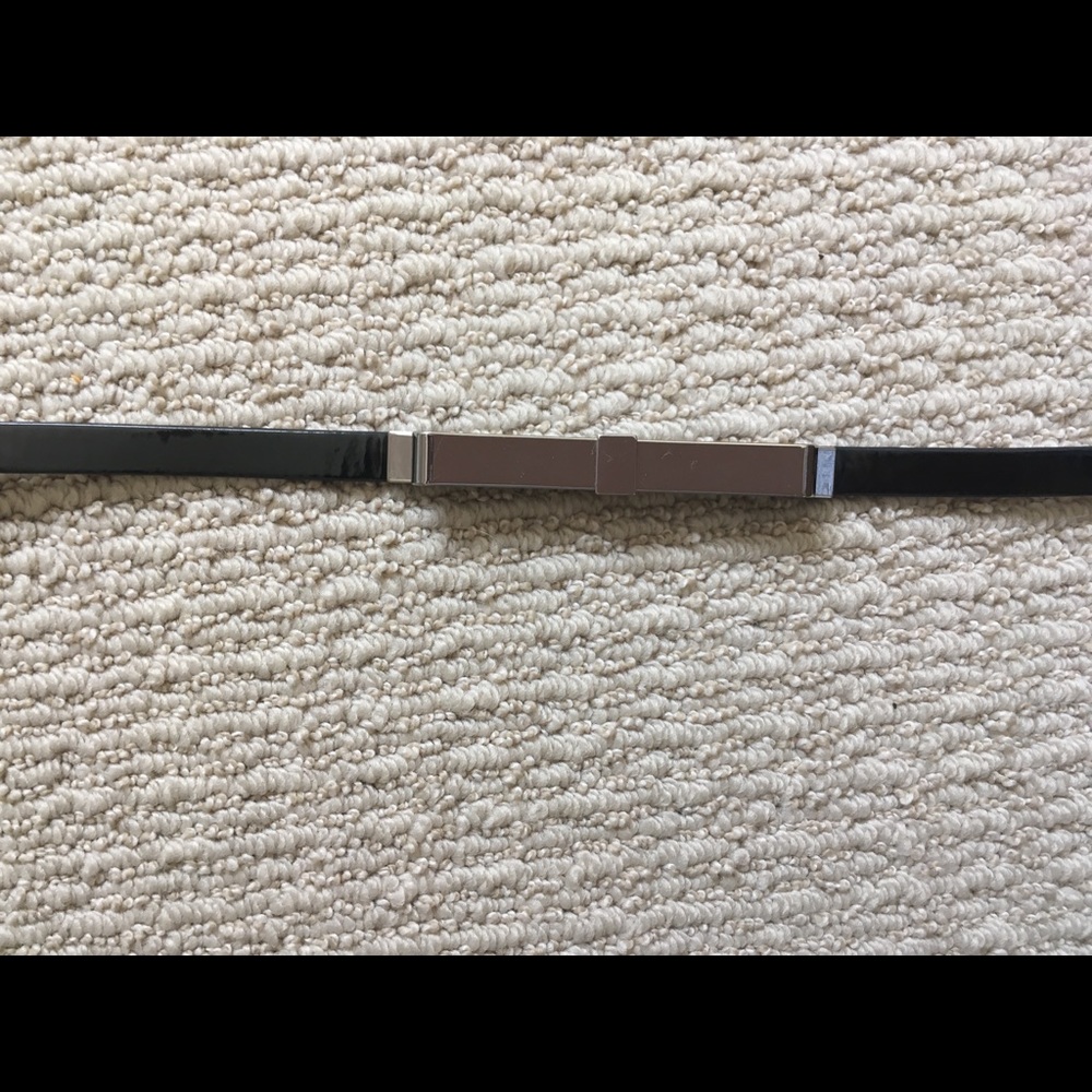 Black belt with metal bow